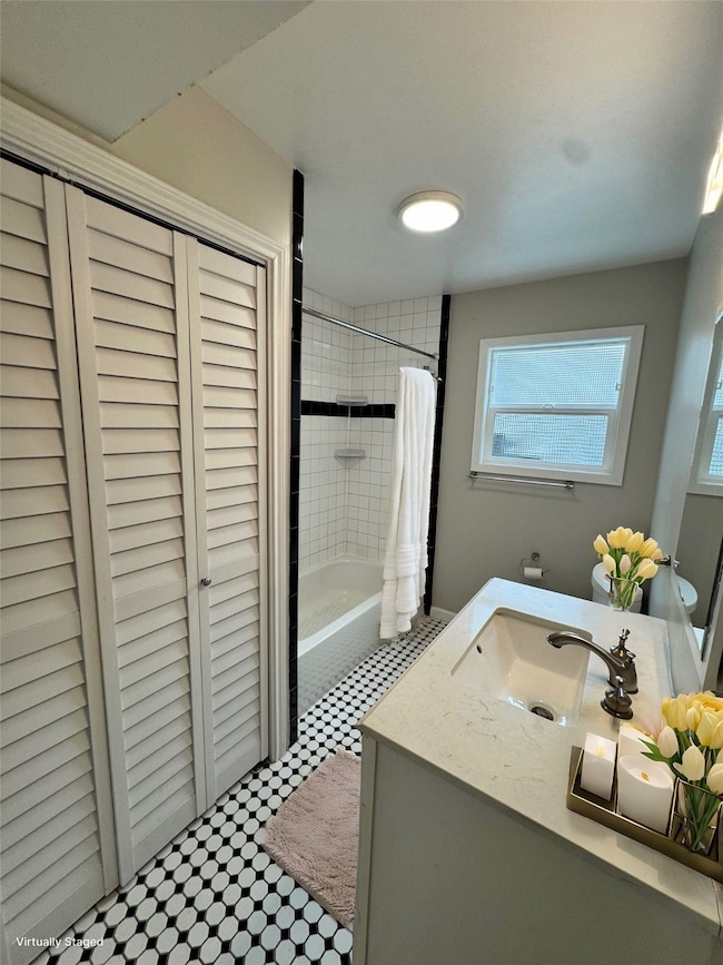 Full Bathroom with additional storage and laundry