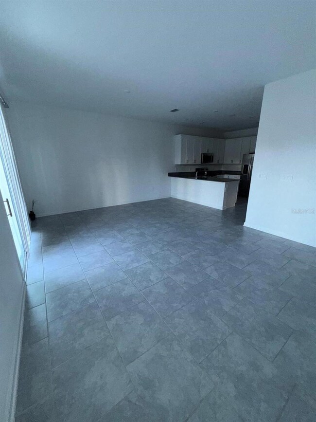 7477 Stone Creek Trail, Kissimmee, FL 34747 - photo 6