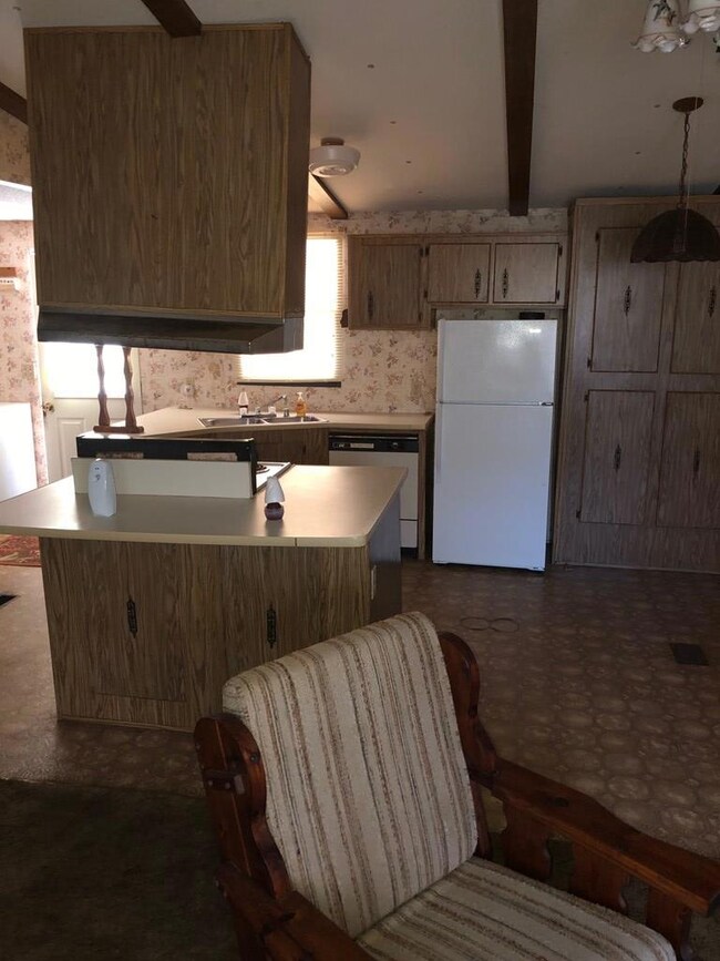 View into kitchen from living room