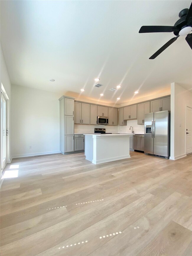 Kitchen featuring appliances with stainless steel