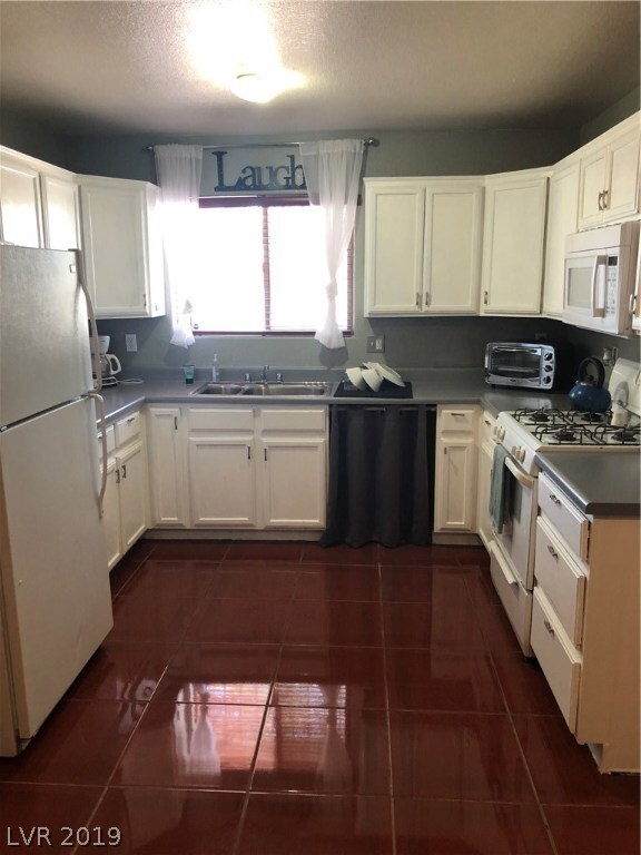 The perfect amount of storage space! Pantry on lef