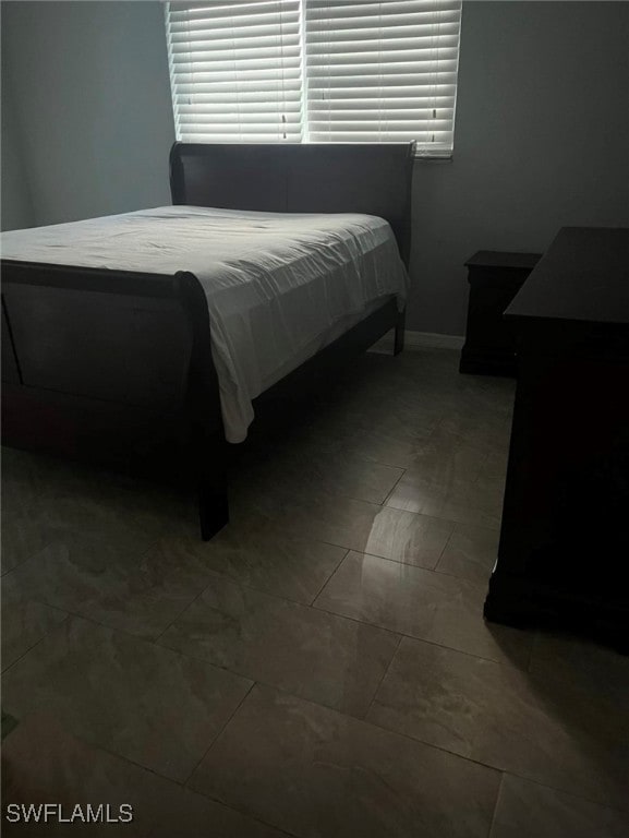 Bedroom with baseboards