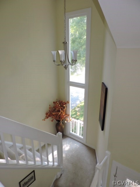 2-story window at staircase invites lots of natura