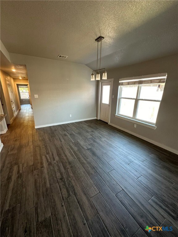 Living and dining open to  the kitchen.