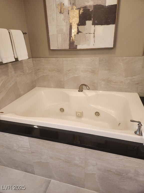 Bathroom with a jetted tub
