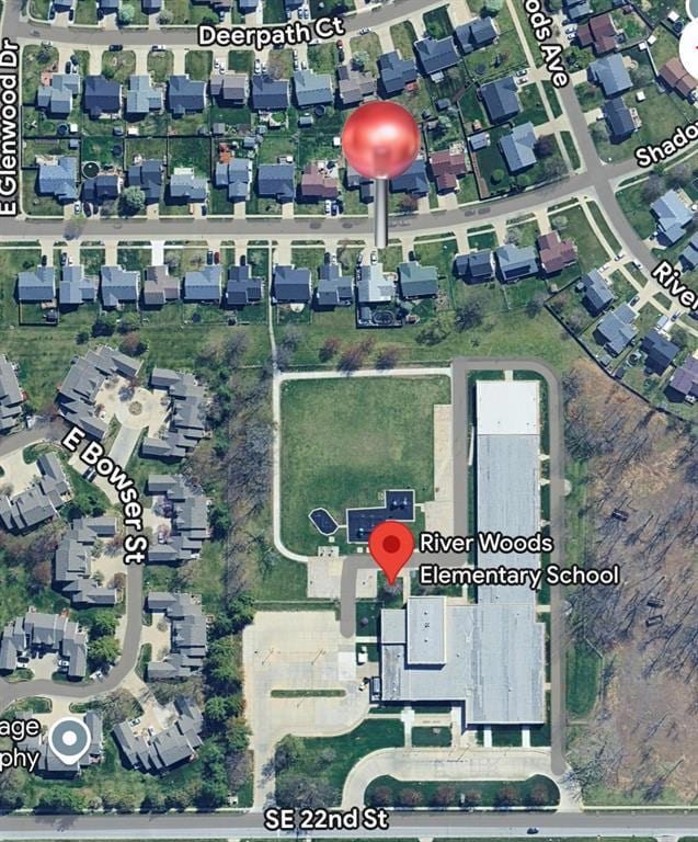 Backs to elementary school playground