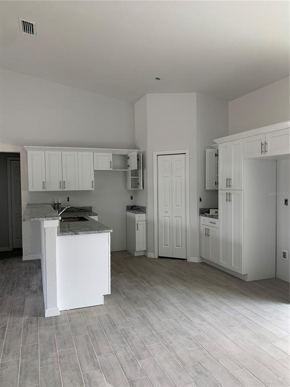 Kitchen Appliances included: Refrigerator, Stove, 