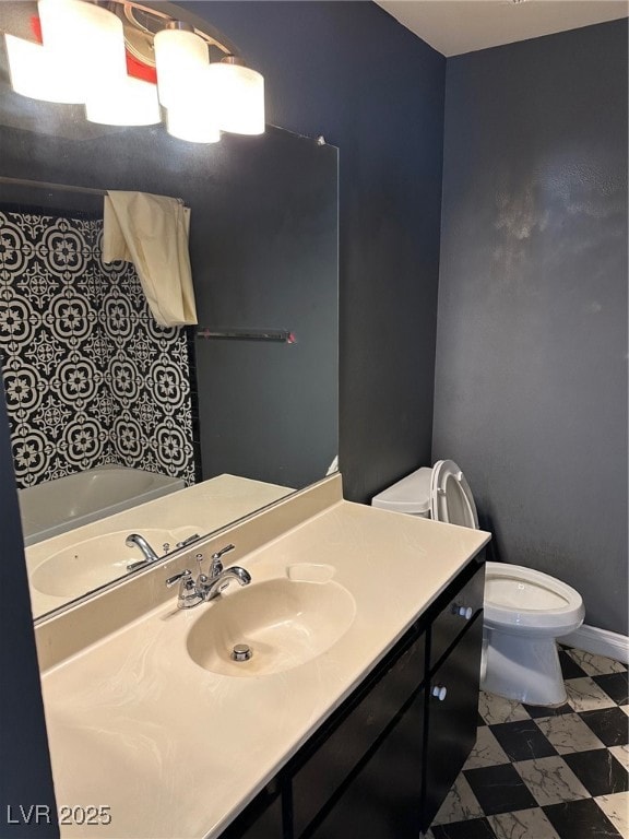 Full bath featuring toilet and vanity