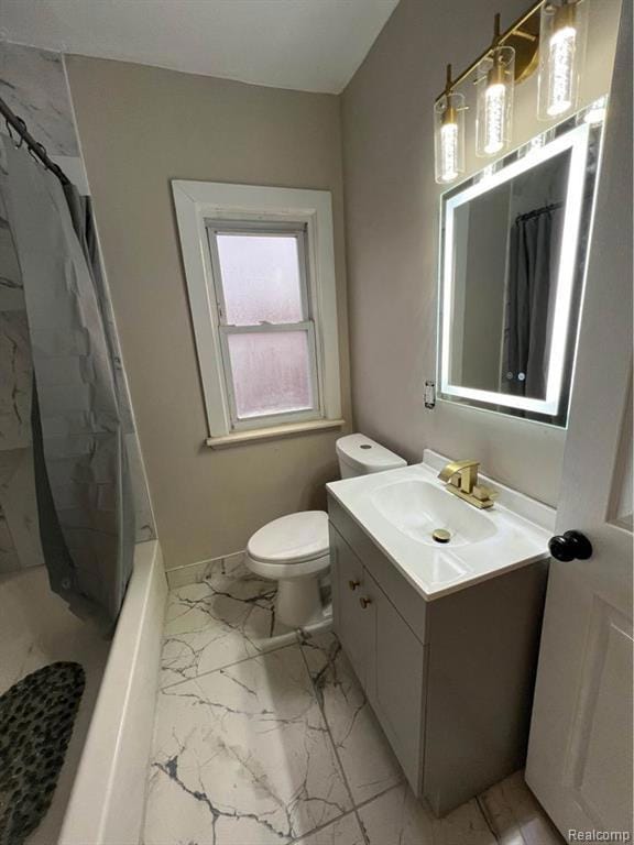 Full bath with light marble finish flooring, vanity, and shower / tub combo with curtain