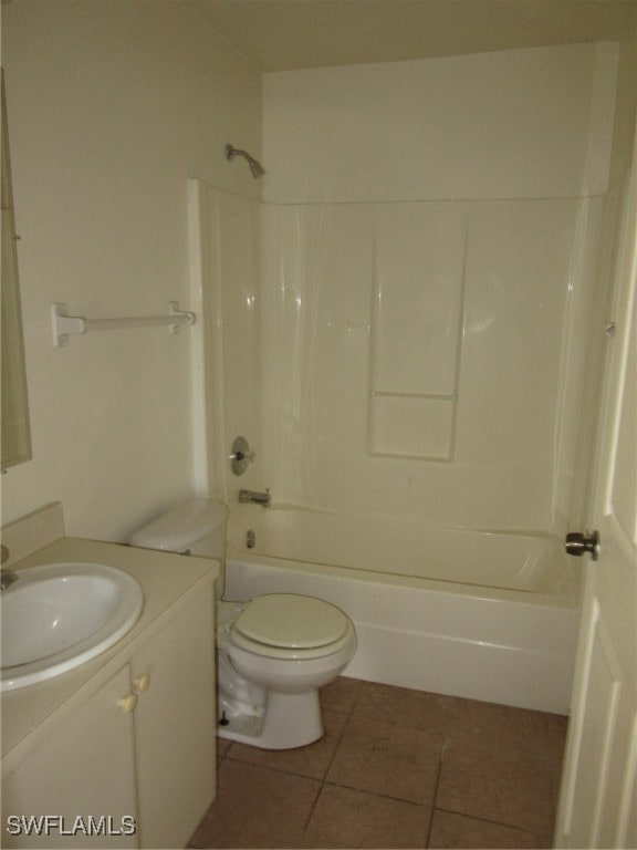Bathroom with vanity, tile patterned floors, showe