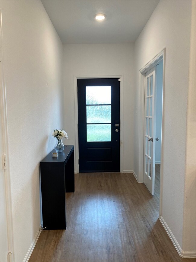 This is a floor plan of a home featuring four bedr