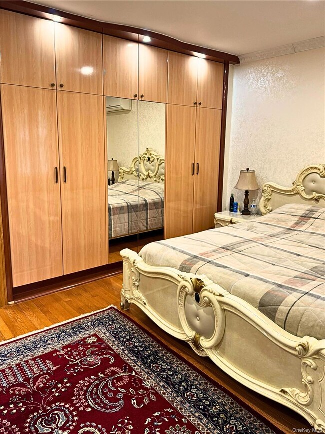 Bedroom featuring a closet and light wood finished floors