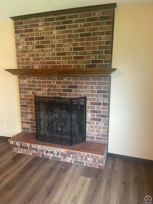 Brick Fireplace w/Gas Logs