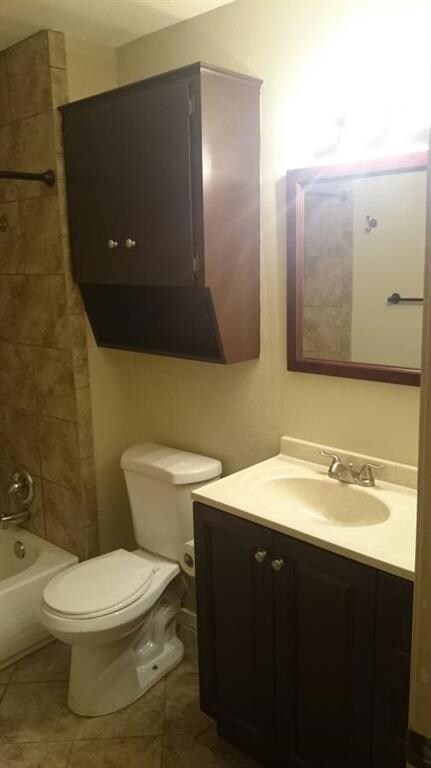 Bathroom featuring bathing tub / shower combinati