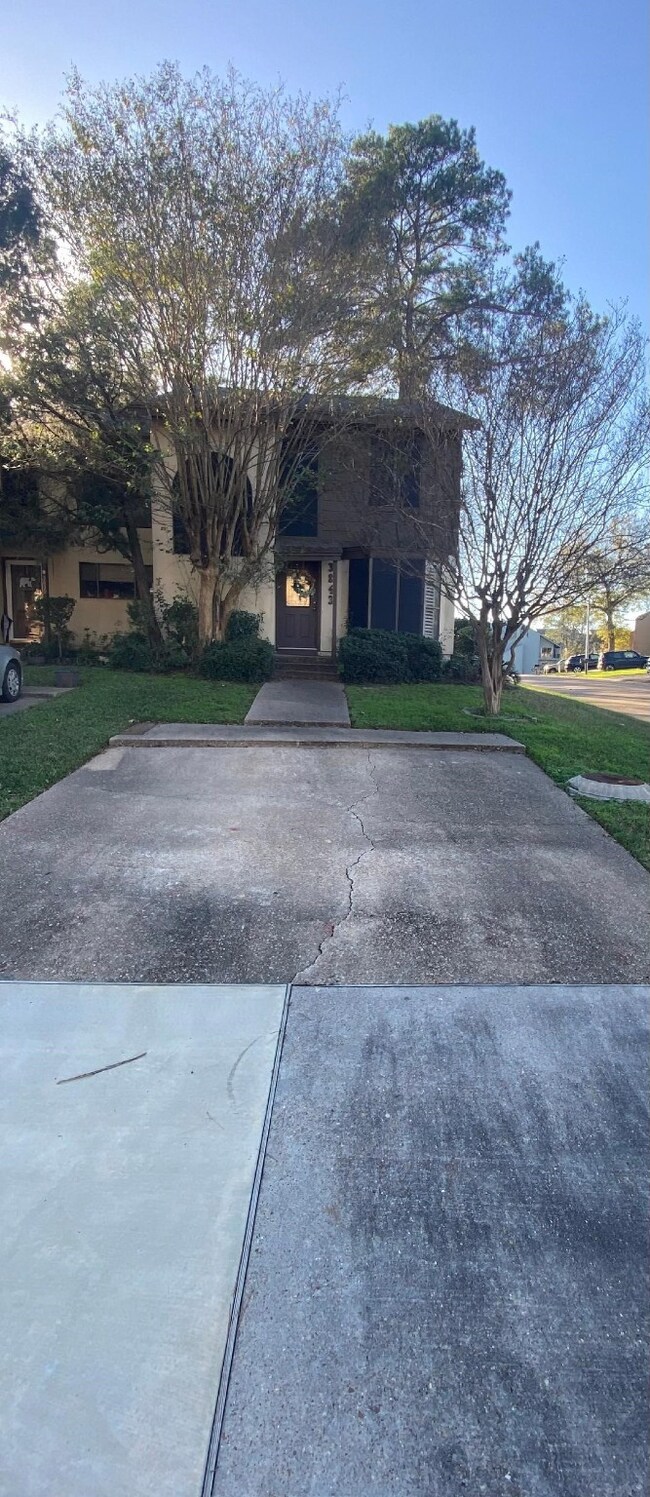 Front of townhome showing parking area