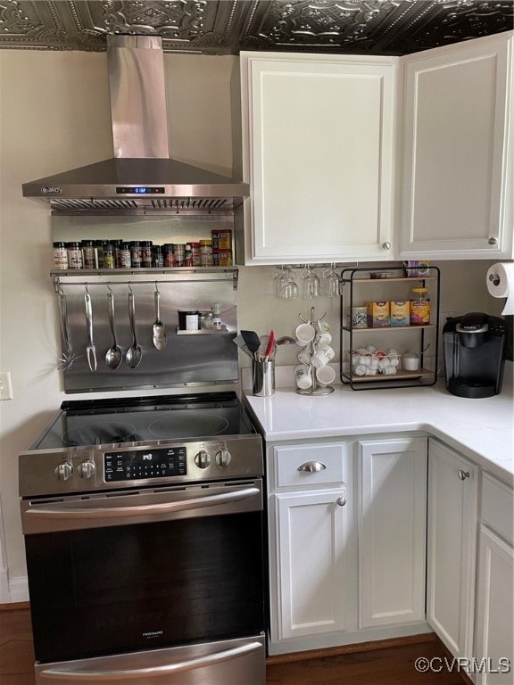 Kitchen with stove, ventilation hood, white cabine