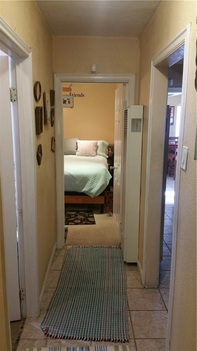 Hallway to bedrooms and bathroom