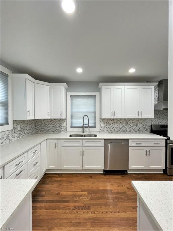 Kitchen view with quartz countertops and recessed 