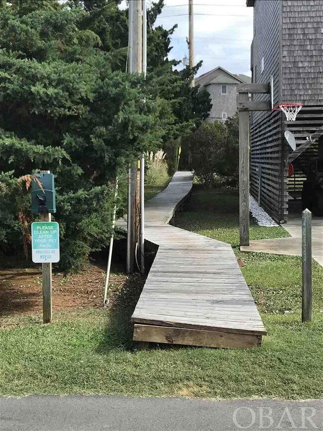 heads east to sidewalk along Rt 12