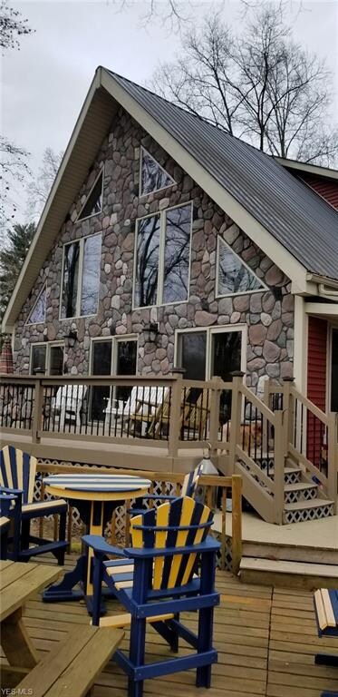 House facing the river....gorgeous stone and metal