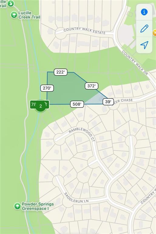 Largest lot in the neighborhood. Approximately 2.4 acres backs up to trees, a creek, and the Silver Commet Trail.