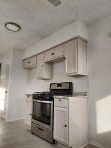 Kitchen with stainless steel range with gas cookto