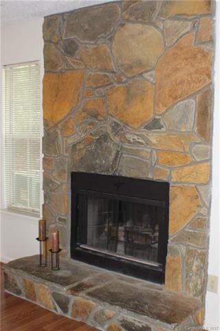 The Wood burning Stone Fireplace with raised heart