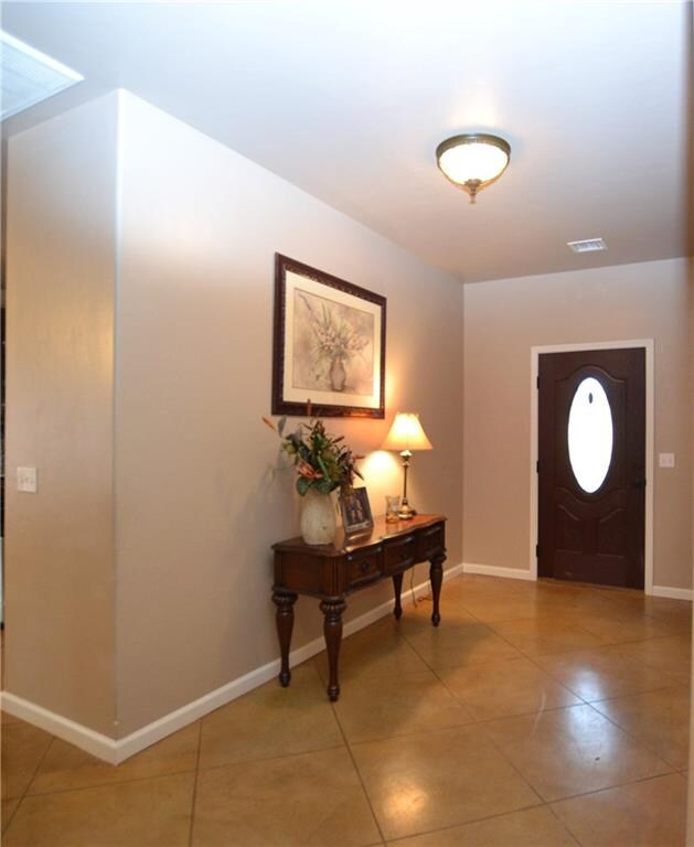 Beautiful stamped concrete flooring throughout ent