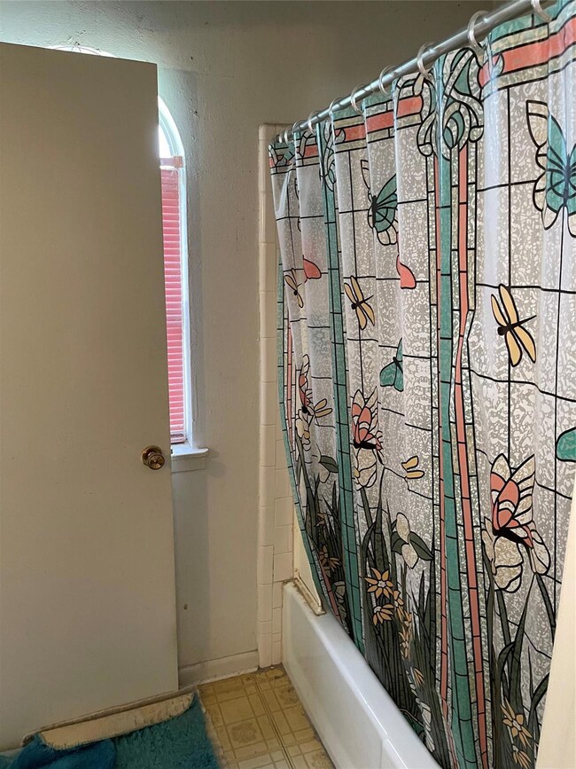 Bathroom with vanity. Opens up to hall. Primary si