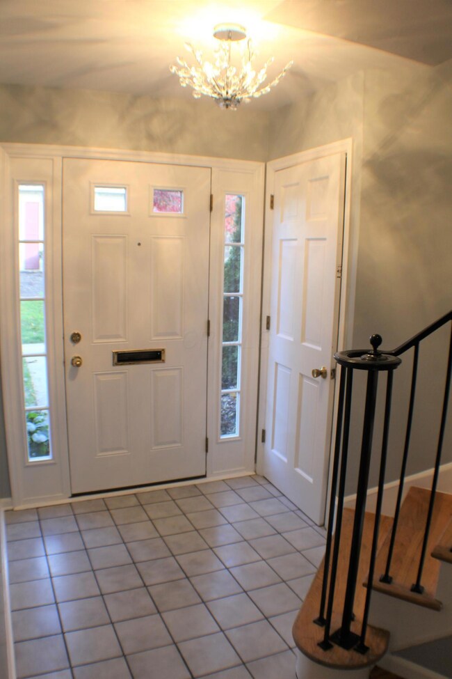 Foyer with updated lighting