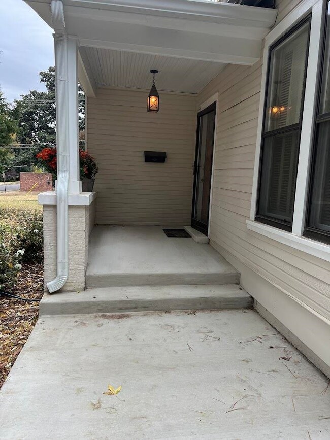 NEWLY POURED CONCRETE FRONT PORCH