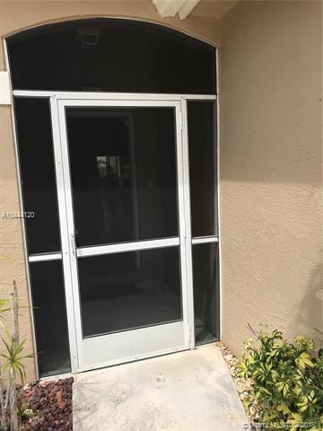 Front of home walkway and screen enclosed entry po
