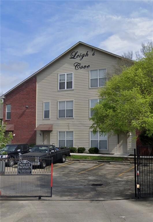 Leigh's Cove Condo exterior with electronic gate e
