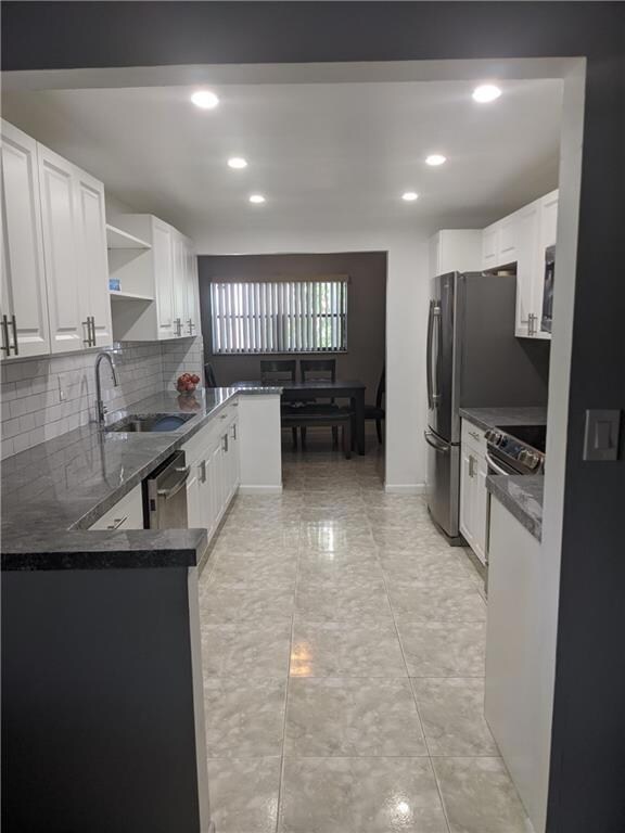 This kitchen has to entries, one leads to dinning