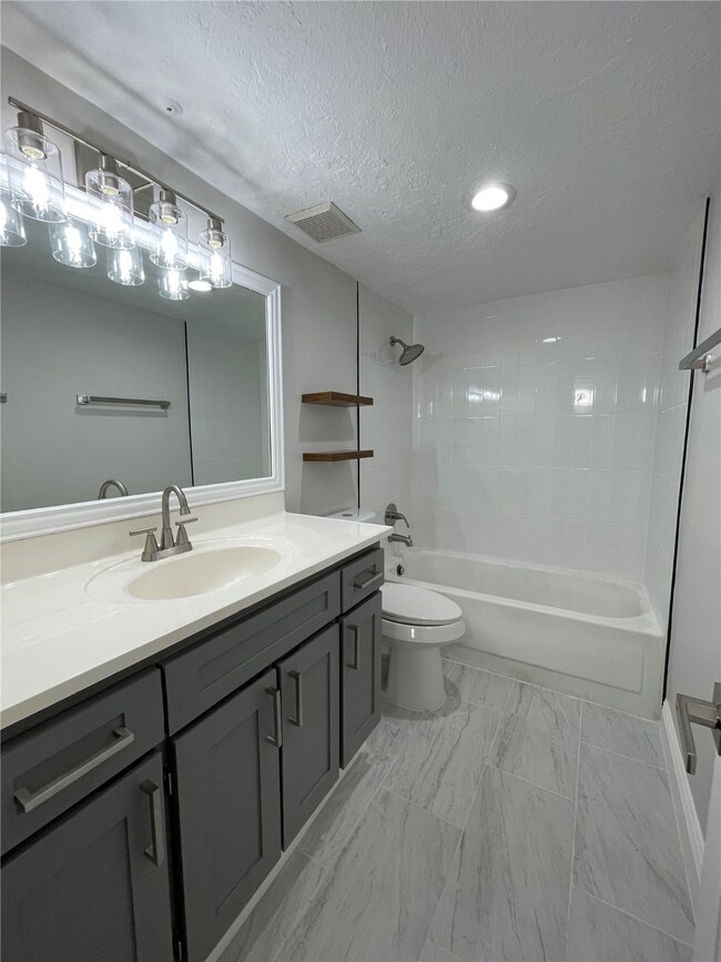 Ceramic tile flooring, new lighting, cabinetry and