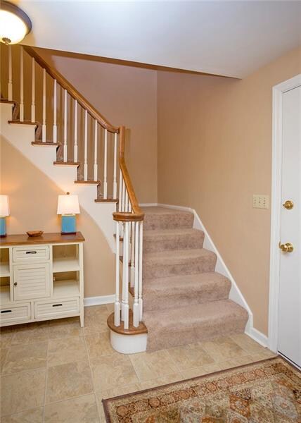Walk in to this spacious home with large foyer, co