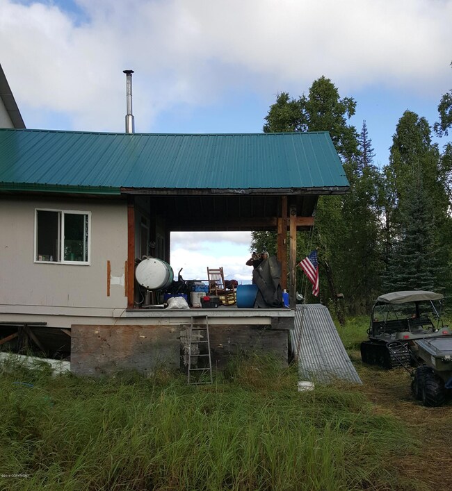 Cabin with raisable ramp