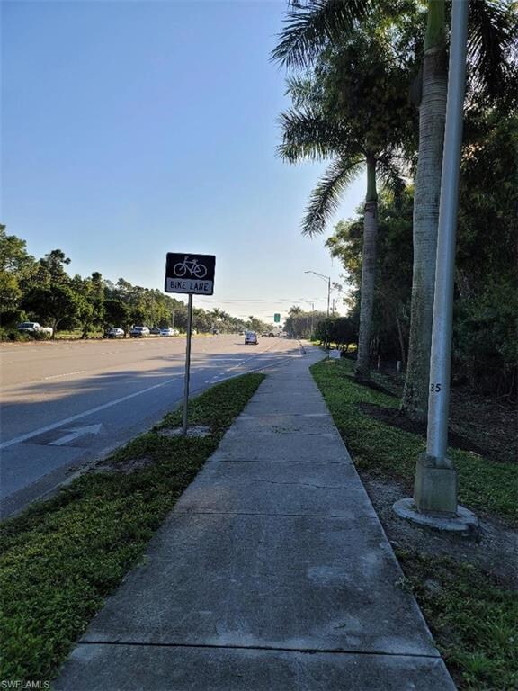 VIEW EAST FROM SIDEWALK
