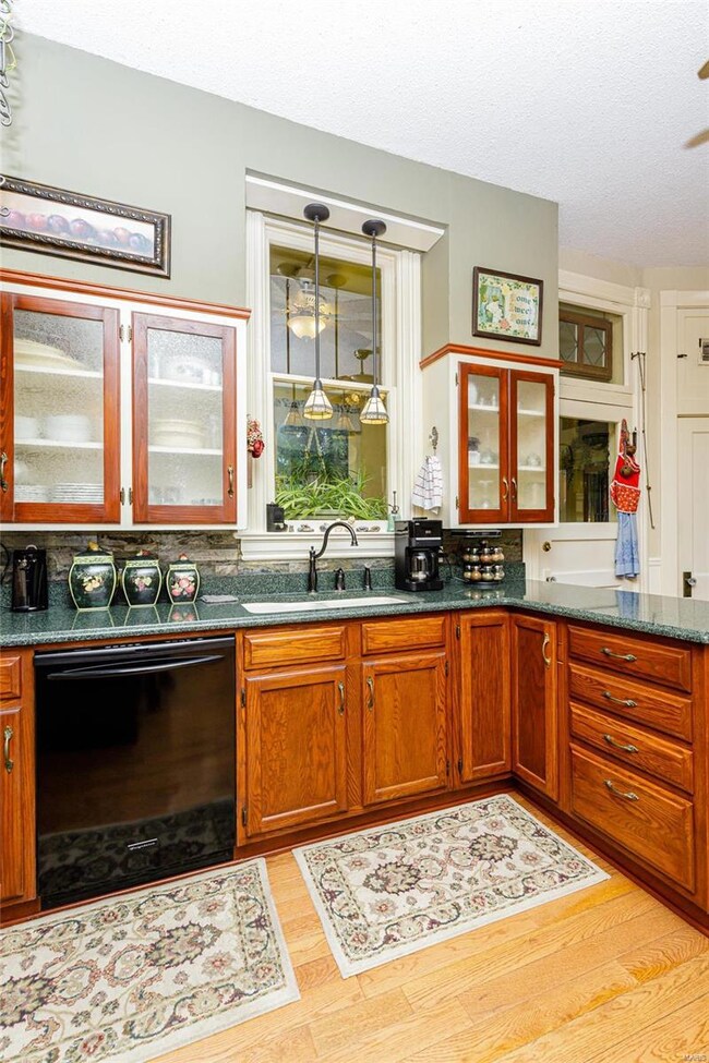 Kitchen with Solid Surface Countertops and Wall Ca