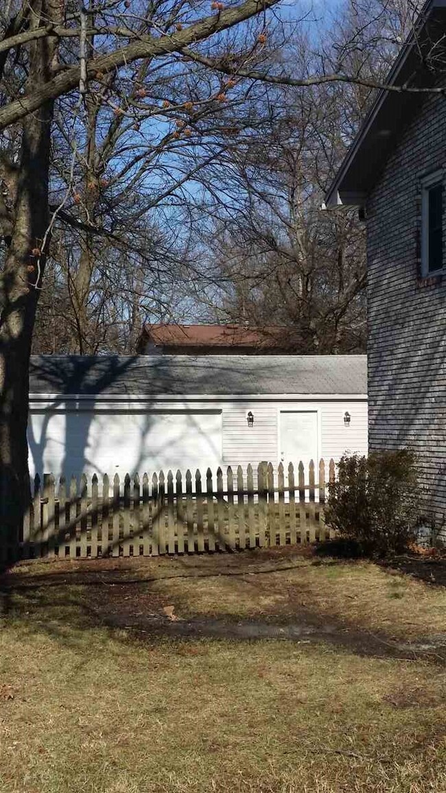 Side yard with picket fence