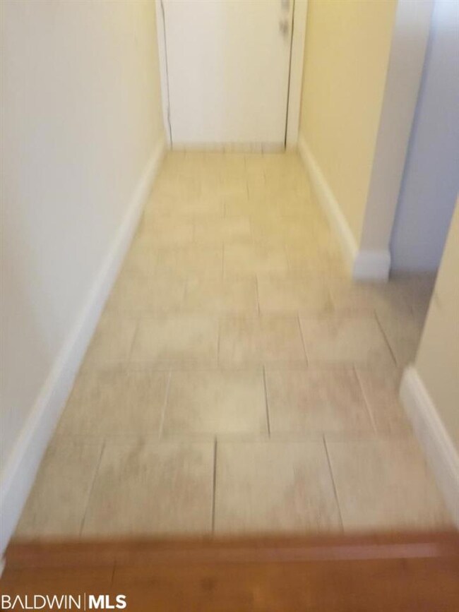 Tile Entry & Bathrooms & Kitchen all other is wood