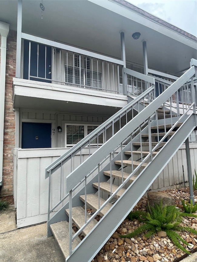 The exterior staircase leading to an upper-level u