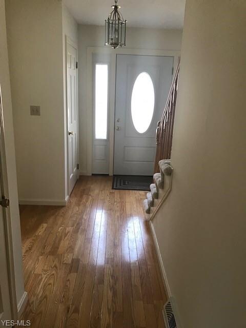 FOYER HARDWOOD FLOORING, NEW PAINT, COAT CLOSET - 