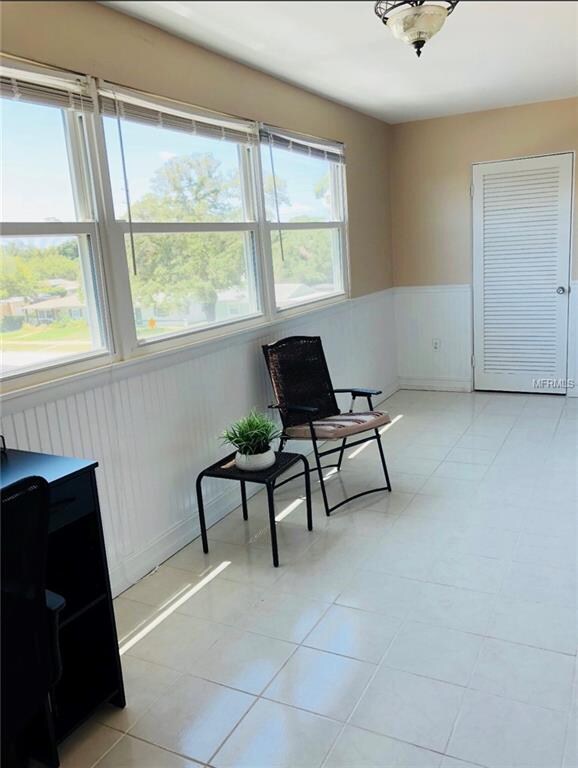 Enclosed 3rd floor Florida room, perfect to make a