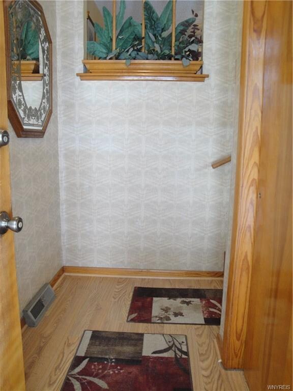 Foyer with Double Coat Closet
