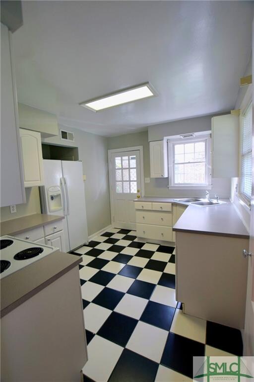 View walking into this adorable Kitchen off the Di