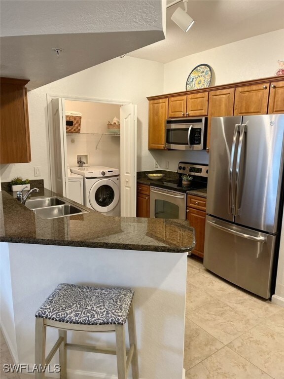 Kitchen featuring appliances with stainless steel
