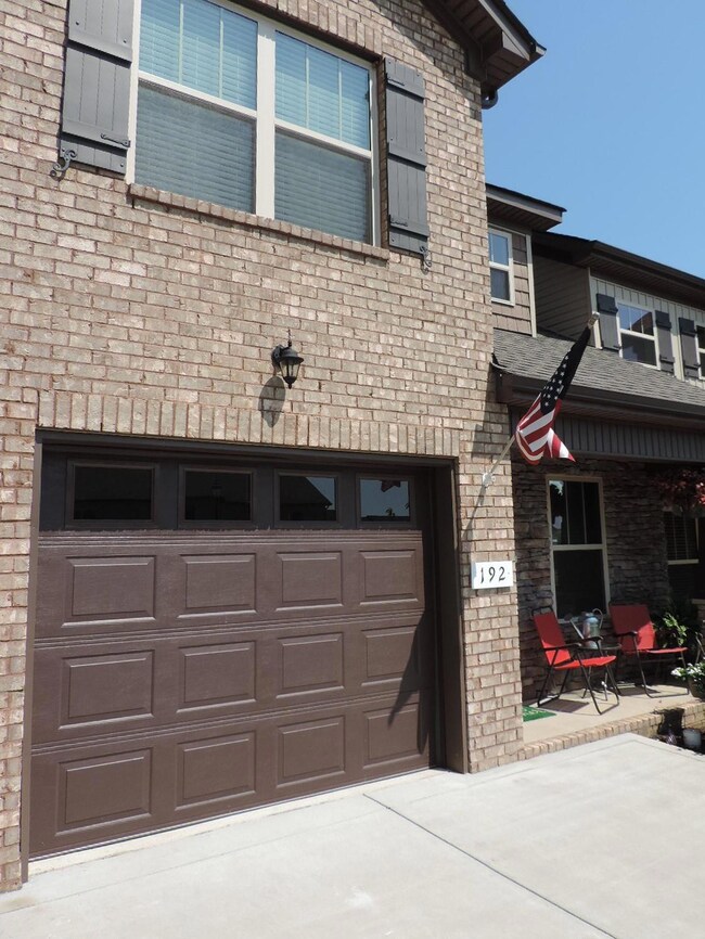 One car garage with garage door opener.