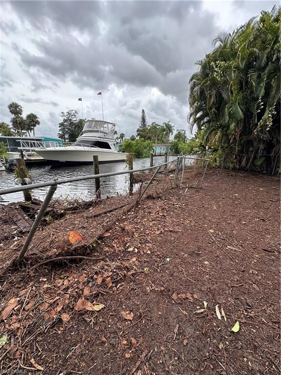View of yard featuring a water view