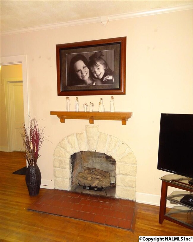 Cozy living room with a beautiful fireplace!